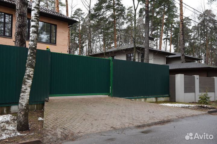 Откатные ворота с врезной калиткой