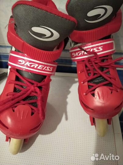 Роликовые коньки