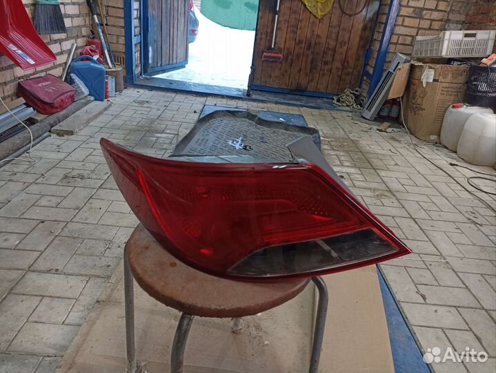 Фонарь левый оригинал солярис