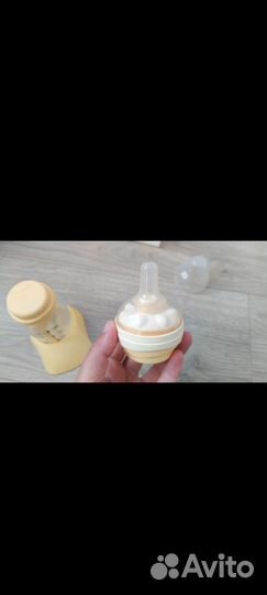 Молокоотсос medela ручной + 2 бутылочки