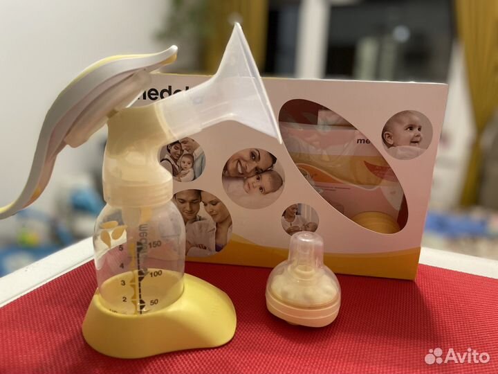 Молокоотсос ручной medela
