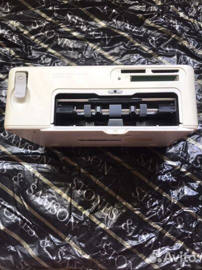 Compact photo printer