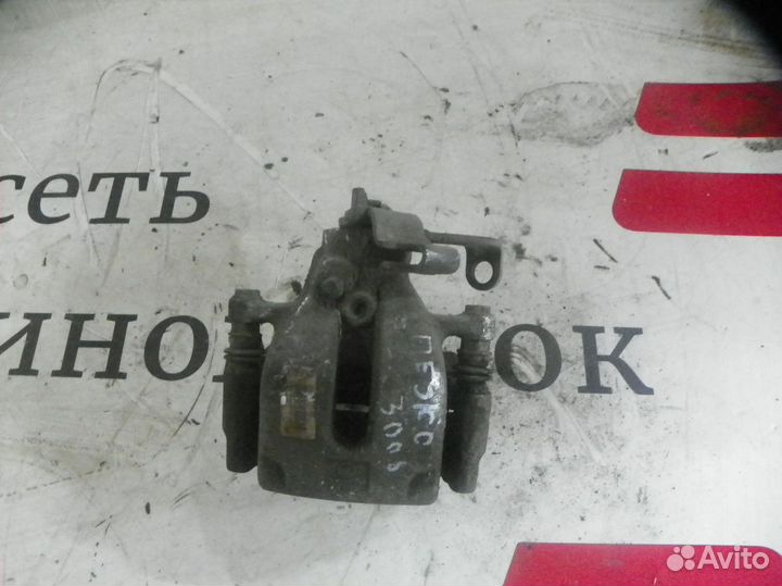 Суппорт тормозной задний левый Peugeot 3008