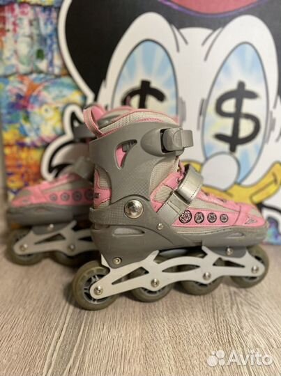 Роликовые коньки