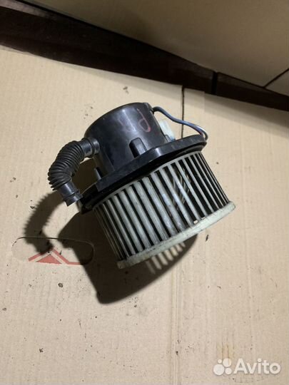 Моторчик отопителя Nissan Primera P11