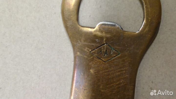 Открывалка для бутылок с клеймом в ромбе 
