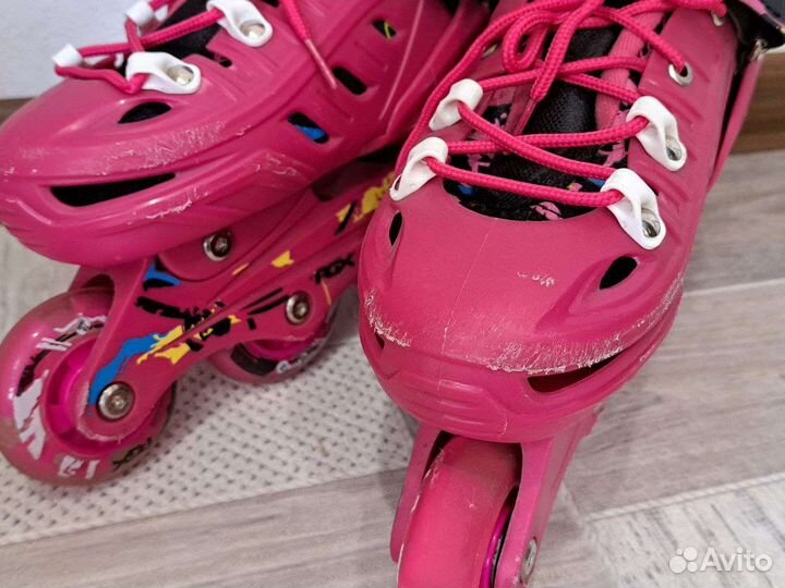 Роликовые коньки