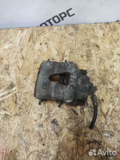 Суппорт передний левый Volkswagen Polo 4