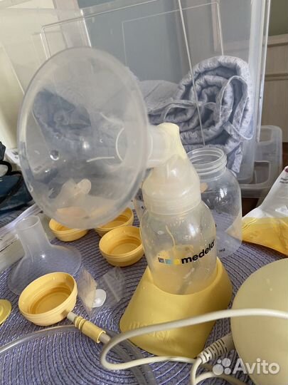 Молокоотсос medela электрический