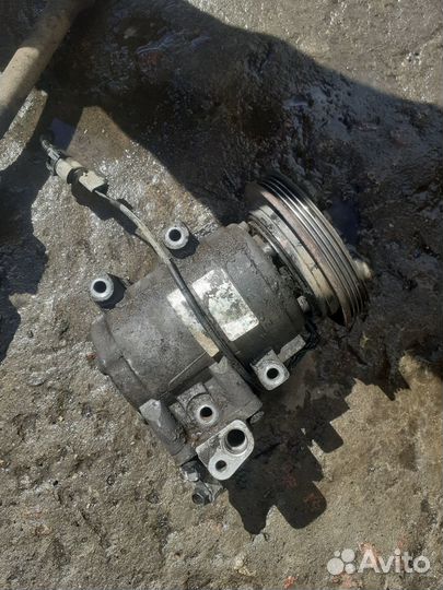 Компрессор кондиционера Kia Spectra