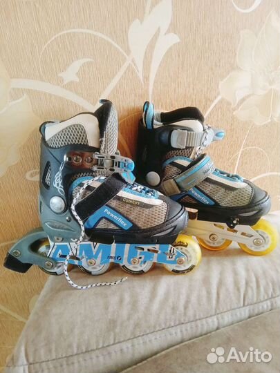 Роликовые коньки