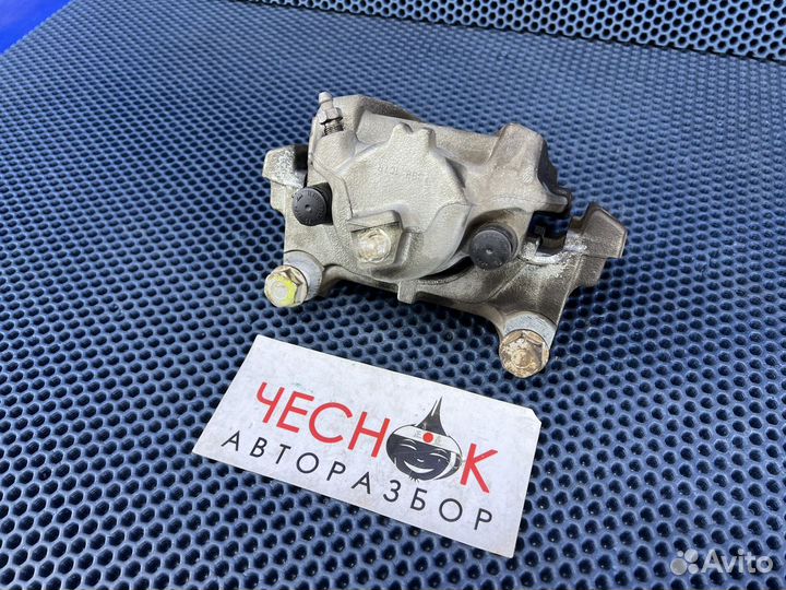 Суппорт тормозной передний левый VW Tiguan NF