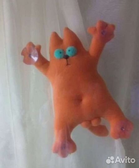 Кот (на присосках)