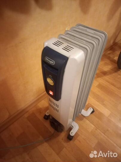 Масляный обогреватель delonghi