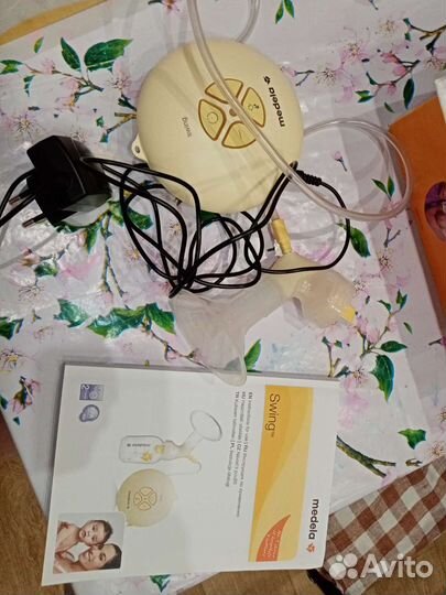 Молокоотсос medela электрический