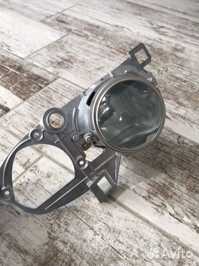 Линза в фару Subaru Legacy