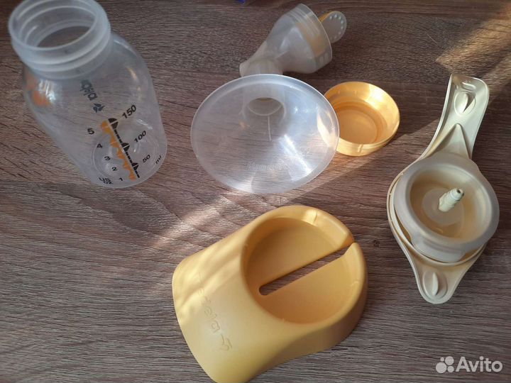 Молокоотсос medela ручной