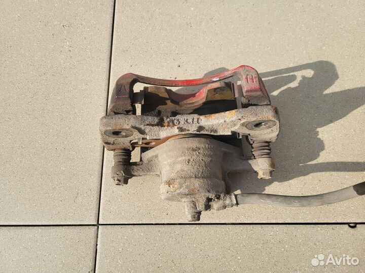 Тормозной суппорт передний левый Chevrolet Лачетти