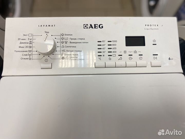 Стиральная машина с вертикальной загрузкой AEG