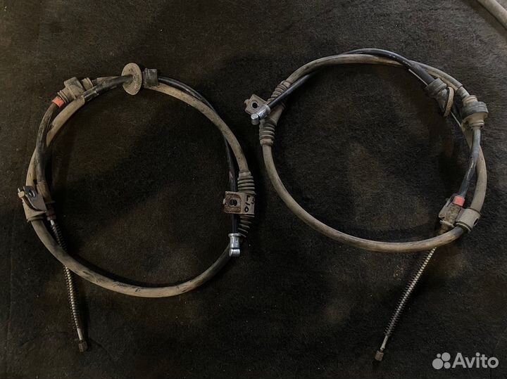 Трос ручника Mitsubishi lancer 10