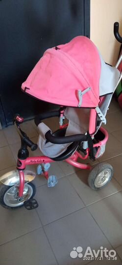 Трехколесный велосипед с ручкой