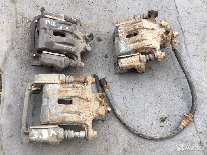 Суппорт тормозной задний Мазда сх-7 Mazda CX 7