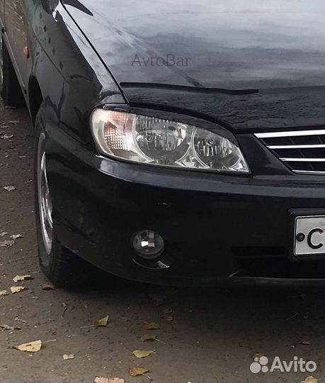 Реснички на фары Kia Spectra