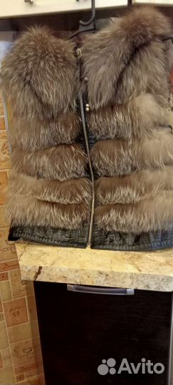 Жилетка меховая женская