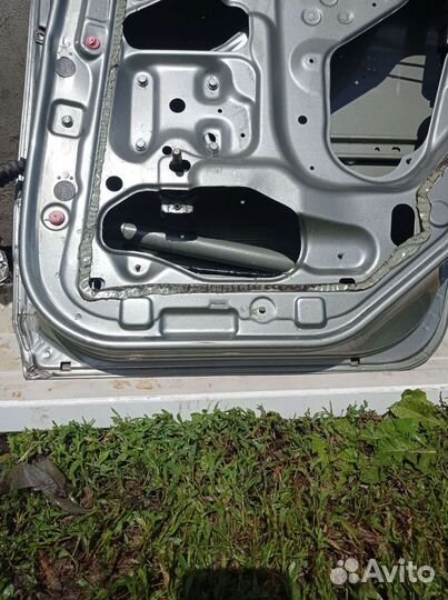 Двери задние Nissan Almera