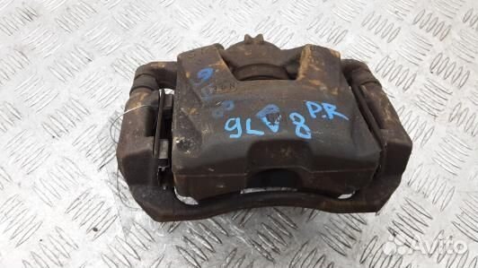 Суппорт тормозной передний правый opel astra J (9L