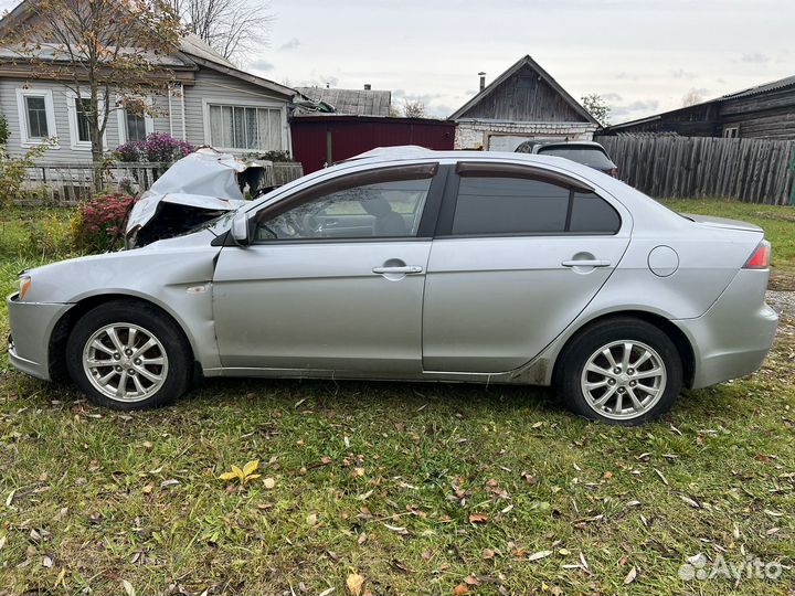 Крышка багажника lancer 10
