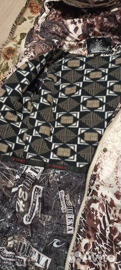 Курточка для девочки зимняя 128-134