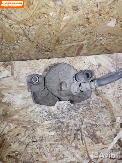 Суппорт тормозной передний левый Mazda 3 BL