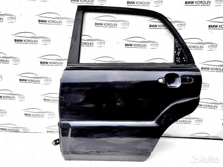 Дверь задняя левая (черная) Kia Sportage