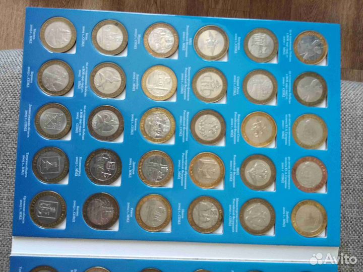 Альбомы с юбилейными 10 р. монетами. Биометалл