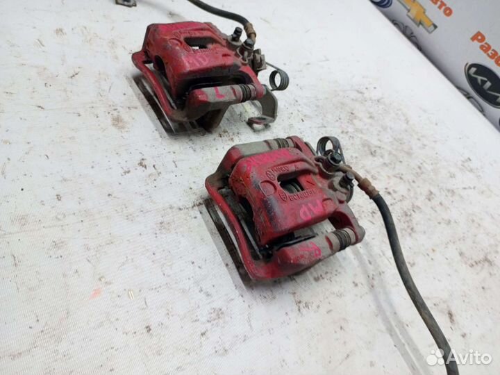 Суппорт тормозной задний Hyundai Elantra MD Avante