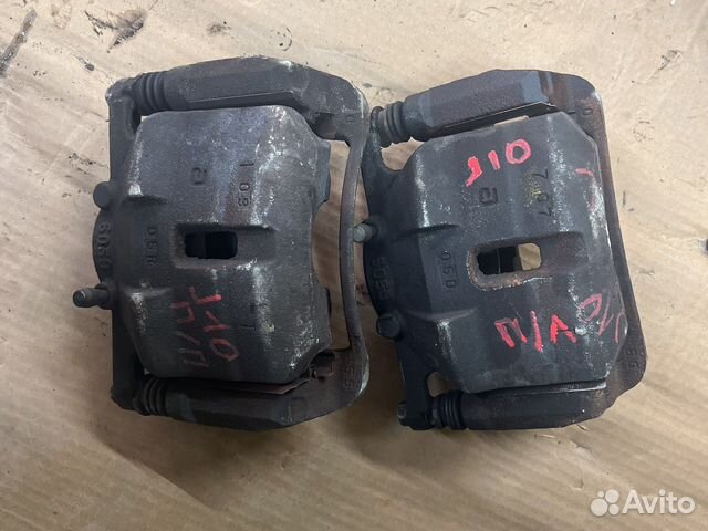 Суппорт передний правый Nissan Qashqai j10