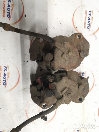 Суппорт тормозной передний Opel Astra H хетчбек