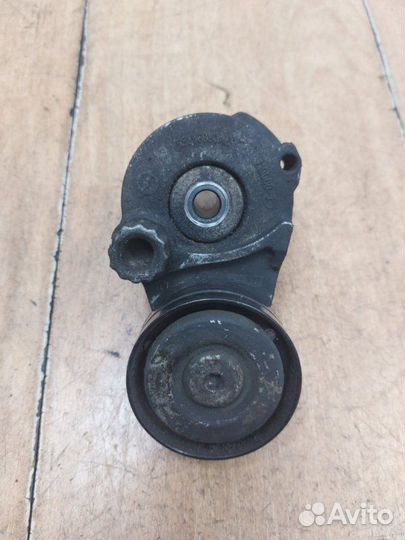Натяжной ролик приводного ремня Opel Astra H