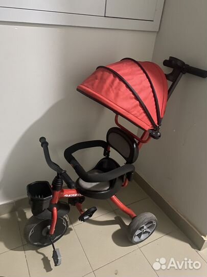 Детский трехколесный велосипед с ручкой