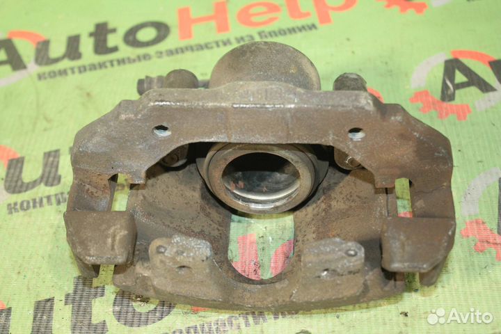 Суппорт тормозной mazda demio DY3W передний левый