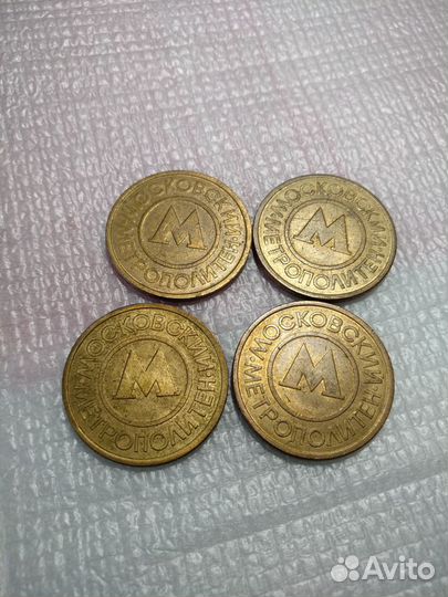 Жетоны метро телефон