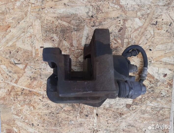 Суппорт тормозной передний правый Mazda CX-5 KE