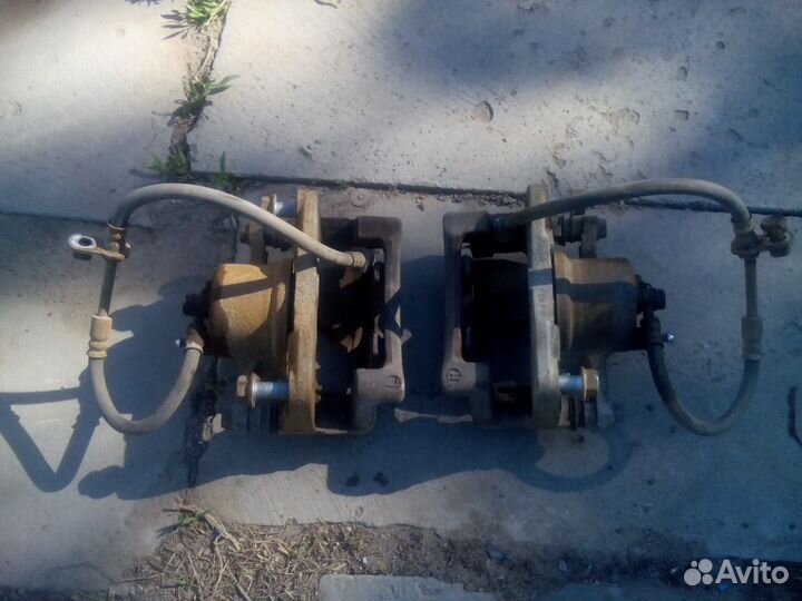 Суппорт тормозной на Toyota Vitz Yaris 90 кузов