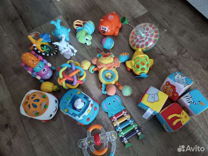 Погремушки игрушки коврик развивающий