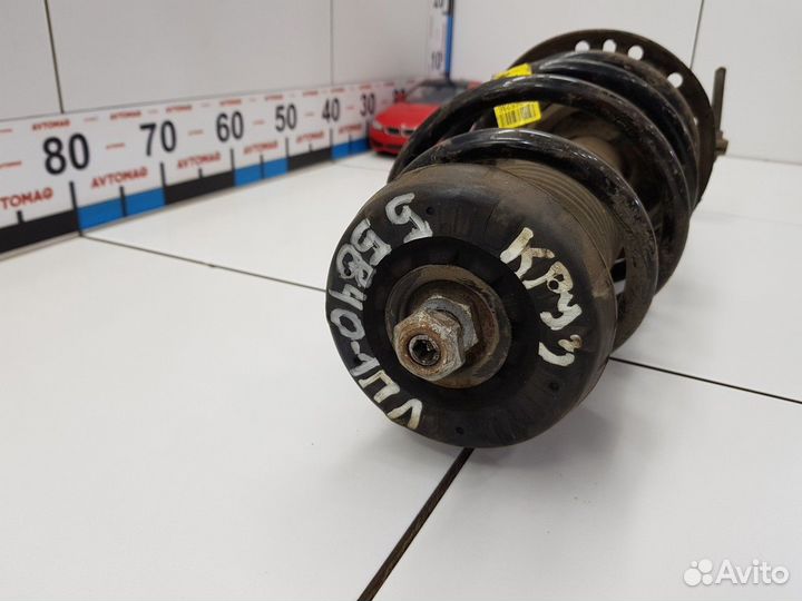 Амортизатор передний левый с пружиной