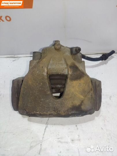 Суппорт тормозной передний левый Opel Astra