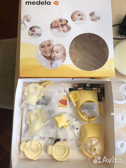 Молокоотсос medela swing maxi