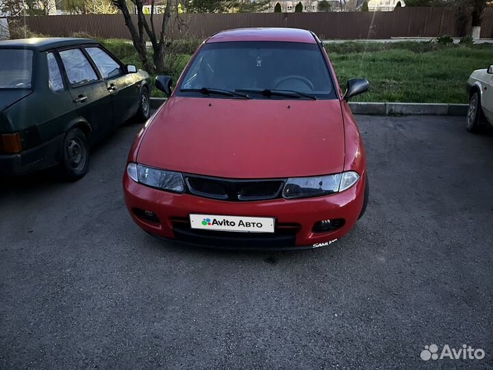 Mitsubishi Carisma 1.6 МТ, 1997, битый, 394 000 км