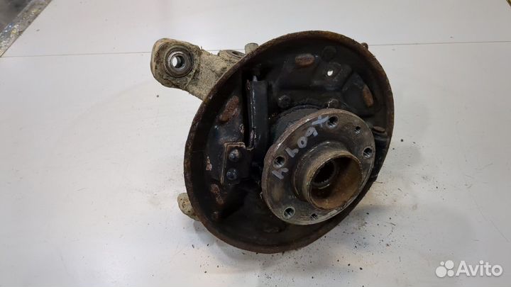 Ступица (кулак, цапфа) левая задняя Dacia Duster